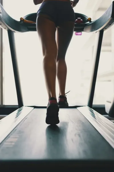 Beautiful girl on a treadmill — On the treadmill