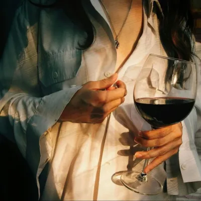Girl with a glass of wine in her hand