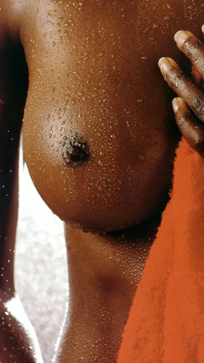 Breasts of a black woman — Black tits