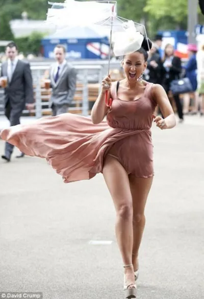 The wind lifts girls' skirts