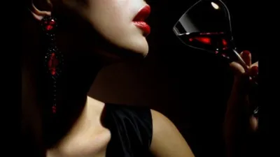 Woman with a glass of wine