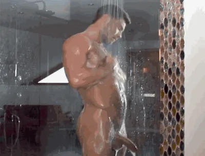 Naked guys wash in the shower